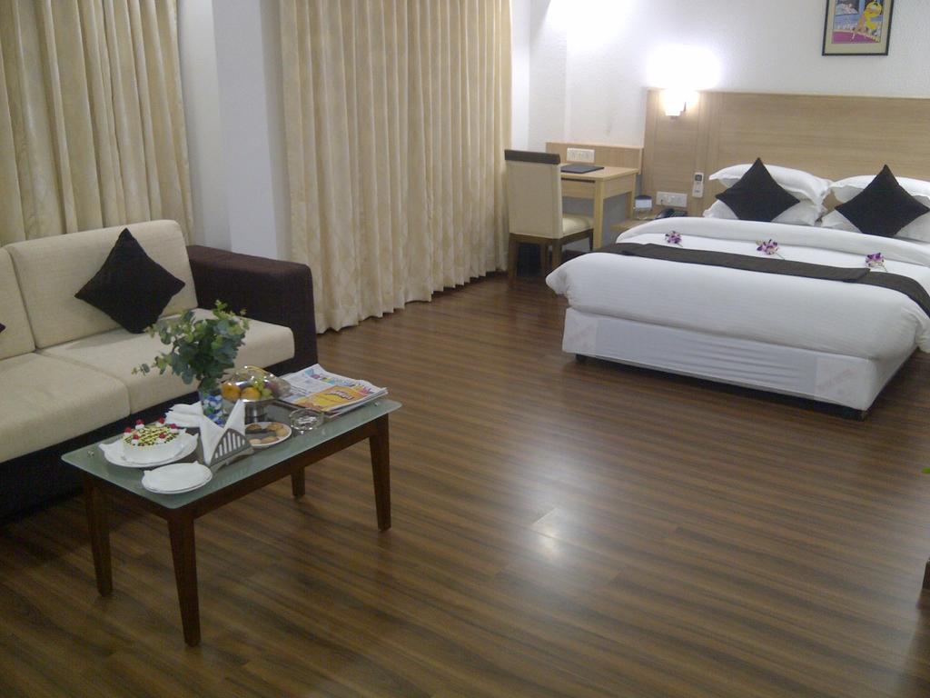 Hotel Ambient Turret Bangalore Quarto foto