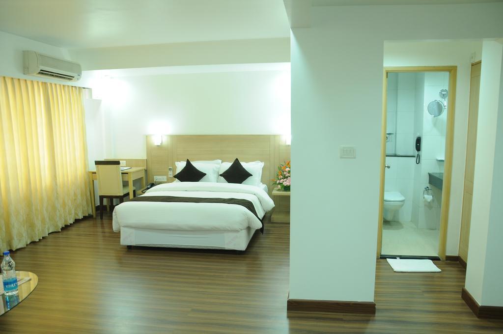 Hotel Ambient Turret Bangalore Quarto foto